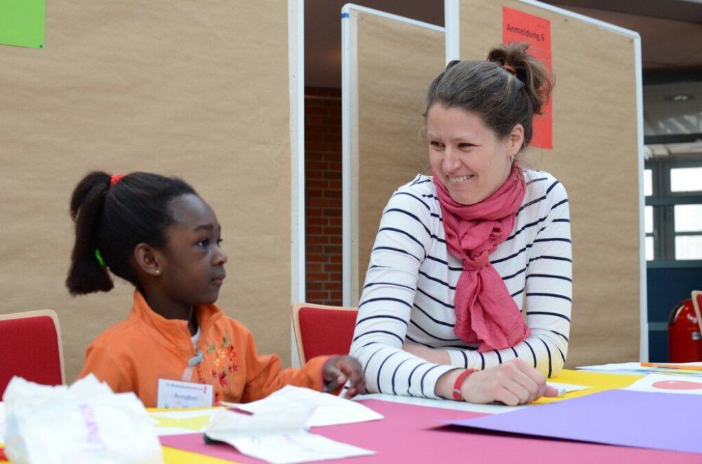 Kind bei der Kinderkonferenz.